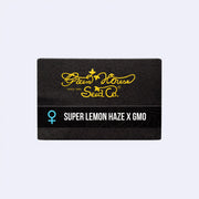 Super Lemon Haze x GMO Feminisierte Samen von Green House Seeds in schwarzem Verpackungsdesign.